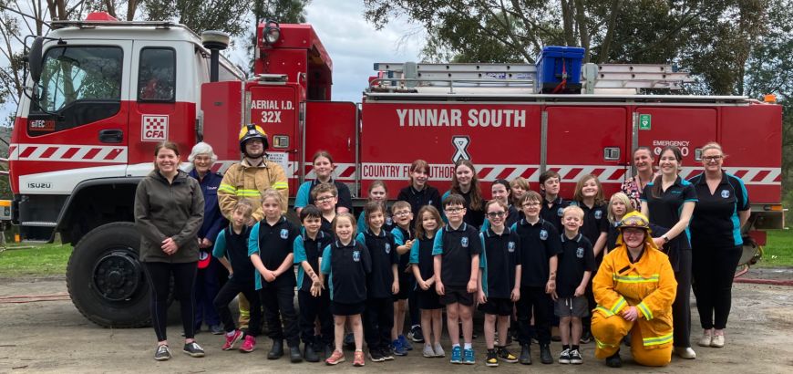 YS primary children in front of the YS fire truck