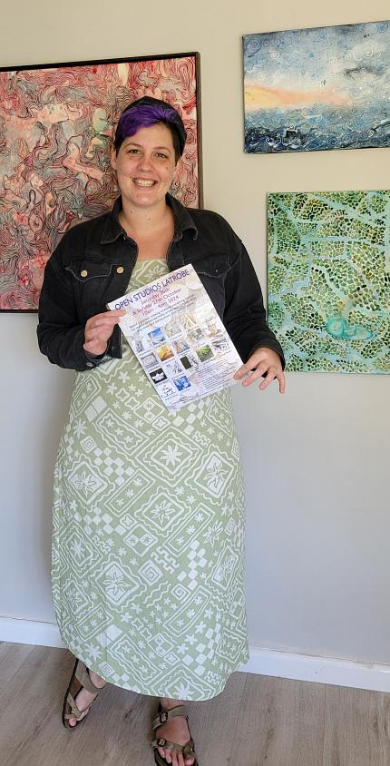 Pollyanna in front of paintings