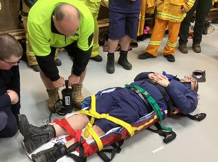 CFA members training with vacuum mattress