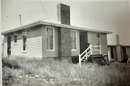 Weatherboard house with no fence